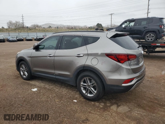 2017 Hyundai Santa Fe 2.4L z VIN 5NMZUDLB7HH030253, wystawiony jako Copart lot #51302445 z przebiegiem 136 074 mil mil oraz Szkoda całkowita • Salvage title. Historia ofert i sprzedaży dostępna na DreamBid. Obrazek 2.