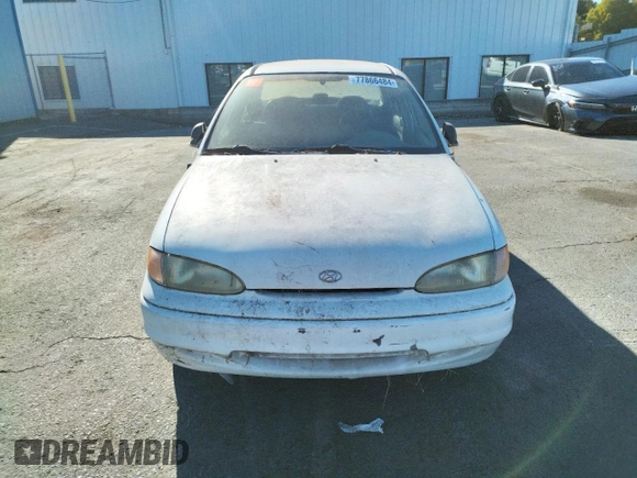 1997 Hyundai Accent z VIN KMHVF24NXVU373676, wystawiony jako Copart lot #77866484 z przebiegiem 151 949 mil mil oraz Tytuł czysty. Historia ofert i sprzedaży dostępna na DreamBid. Obrazek 5.