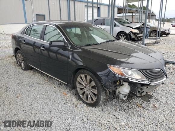 2014 Lincoln MKS EcoBoost z VIN 1LNHL9FT5EG601141, wystawiony jako Copart lot #86497854 z przebiegiem 136 915 mil mil oraz Szkoda całkowita • Salvage title. Historia ofert i sprzedaży dostępna na DreamBid. Obrazek 4.