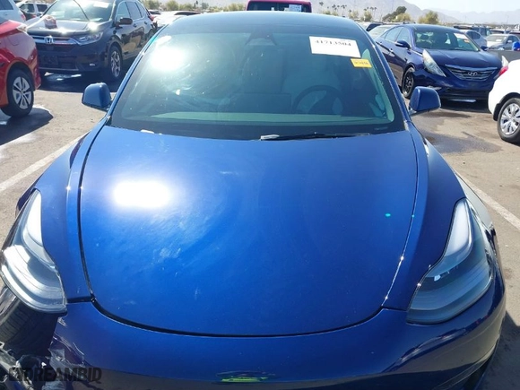 2022 Tesla Model 3 Performance with VIN 5YJ3E1EC4NF347055, listed as a IAAI auction lot 41713504 with 38,266 mi miles. Bid and sale history available at carsss.com. Image 10.