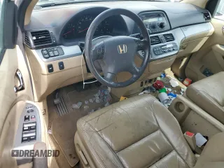 2010 Honda Odyssey EX-L с VIN 5FNRL3H67AB045013, выставлен на аукционе Copart как лот 56686655 с пробегом 231 515 миль миль и Чистый • Clean title. История ставок и продаж доступна на DreamBid. Изображение 8.