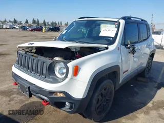 2018 Jeep Renegade Trailhawk with VIN ZACCJBCB7JPH42314, listed as a IAAI auction lot 41436327 with 77,834 mi miles. Bid and sale history available at carsss.com. Image 2.