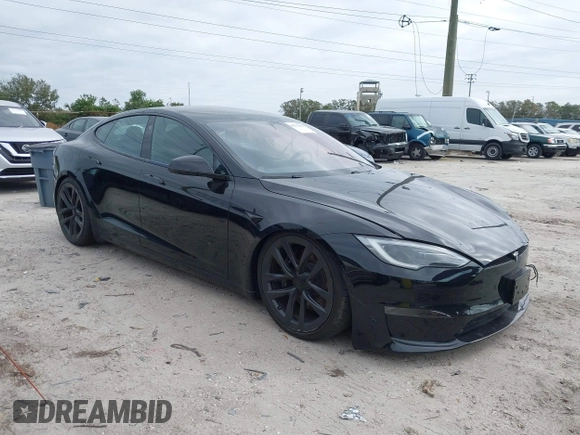 2023 Tesla Model S with VIN 5YJSA1E52PF500088, listed as a IAAI auction lot 41372918 with Not provided miles and . Bid and sale history available at DreamBid. Image 1.
