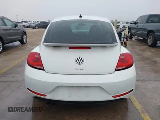2018 Volkswagen Beetle S with VIN 3VWFD7AT3JM703443, listed as a IAAI auction lot 41437909 with 76,757 mi miles. Bid and sale history available at carsss.com. Image 16.