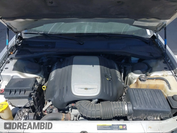2005 Chrysler 300 with VIN 2C3AA63HX5H125777, listed as a IAAI auction lot 41843281 with 115,034 mi miles. Bid and sale history available at carsss.com. Image 10.