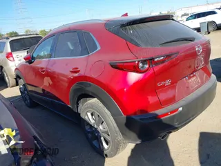 2024 Mazda CX-30 2.5 S Premium Package with VIN 3MVDMBDM0RM628115, listed as a IAAI auction lot 40679651 with 5,082 mi miles. Bid and sale history available at carsss.com. Image 3.