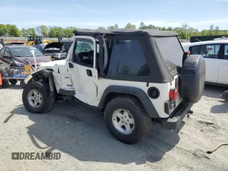 2005 Jeep Wrangler X with VIN 1J4FA39S75P332586, listed as a Copart auction lot 53334725 with 96,728 mi miles and Salvage title. Bid and sale history available at DreamBid. Image 2.