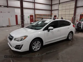 2015 Subaru Impreza Premium with VIN JF1GPAC64FH272292, listed as a IAAI auction lot 42189917 with 125,386 mi miles and . Bid and sale history available at DreamBid. Image 2.