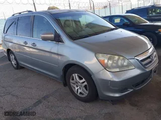 2005 Honda Odyssey EX-L with VIN 5FNRL38775B030316, listed as a IAAI auction lot 41670853 with 183,359 mi miles. Bid and sale history available at carsss.com. Image 3.