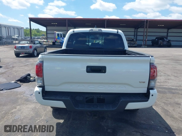2020 Toyota Tacoma SR5 z VIN 5TFCZ5AN5LX231157, wystawiony jako IAAI lot #42045534 z przebiegiem 84 099 mil mil oraz . Historia ofert i sprzedaży dostępna na DreamBid. Obrazek 16.
