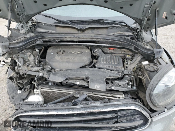2017 MINI Countryman Cooper with VIN WMZYS7C31H3E06457, listed as a Copart auction lot 49351315 with 77,461 mi miles and Salvage title. Bid and sale history available at DreamBid. Image 12.