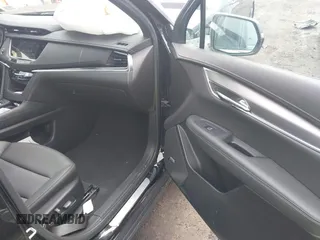 2024 Cadillac XT6 AWD Luxury z VIN 1GYKPBR49RZ723838, wystawiony jako IAAI lot #42346554 z przebiegiem 27 525 mil mil oraz . Historia ofert i sprzedaży dostępna na DreamBid. Obrazek 5.