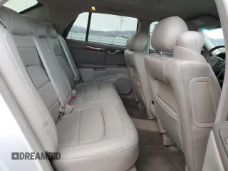 2004 Cadillac DeVille DTS z VIN 1G6KF57944U122824, wystawiony jako Copart lot #86147994 z przebiegiem 118 156 mil mil oraz Szkody całkowita. Historia ofert i sprzedaży dostępna na DreamBid. Obrazek 10.