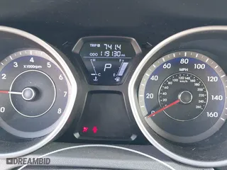 2012 Hyundai Elantra GLS with VIN KMHDH4AE7CU255345, listed as a IAAI auction lot 41520440 with 119,130 mi miles. Bid and sale history available at carsss.com. Image 7.