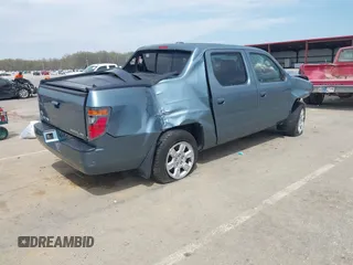 2006 Honda Ridgeline RTL with VIN 2HJYK16536H514530, listed as a IAAI auction lot 42060110 with Not Provided miles and . Bid and sale history available at DreamBid. Image 4.