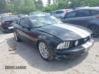 2007 Ford Mustang Deluxe with VIN 1ZVFT80N275301942, listed as a IAAI auction lot 42273941 with 197,000 mi miles and . Bid and sale history available at DreamBid. Image 1.