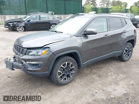 2020 Jeep Compass Trailhawk with VIN 3C4NJDDB3LT200268, listed as a IAAI auction lot 42250192 with 73,804 mi miles and . Bid and sale history available at DreamBid. Image 17.