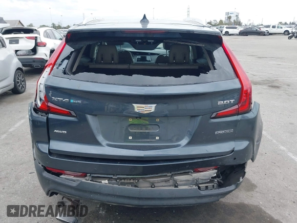 2019 Cadillac XT4 AWD Luxury with VIN 1GYFZBR41KF160352, listed as a IAAI auction lot 42047477 with 58,850 mi miles and . Bid and sale history available at DreamBid. Image 16.