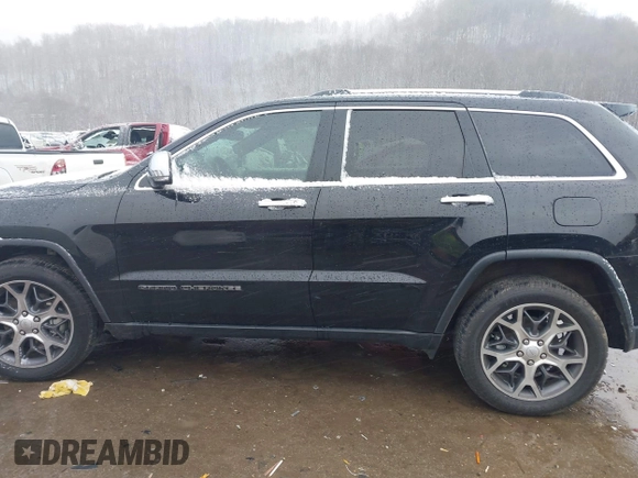 2021 Jeep Grand Cherokee 80th Anniversary with VIN 1C4RJFBG4MC510082, listed as a IAAI auction lot 41072125 with 55,610 mi miles and . Bid and sale history available at DreamBid. Image 15.