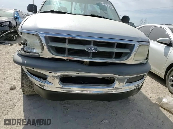 1998 Ford F-150 z VIN 1FTZF18W9WKA65043, wystawiony jako Copart lot #48902695 z przebiegiem 133 727 mil mil oraz Szkoda całkowita • Salvage title. Historia ofert i sprzedaży dostępna na DreamBid. Obrazek 10.