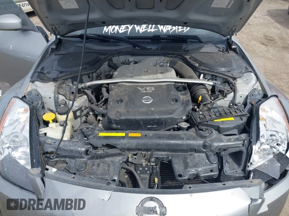 2004 Nissan 350Z Touring with VIN JN1AZ34DX4M100407, listed as a IAAI auction lot 41758380 with 154,166 mi miles. Bid and sale history available at carsss.com. Image 10.