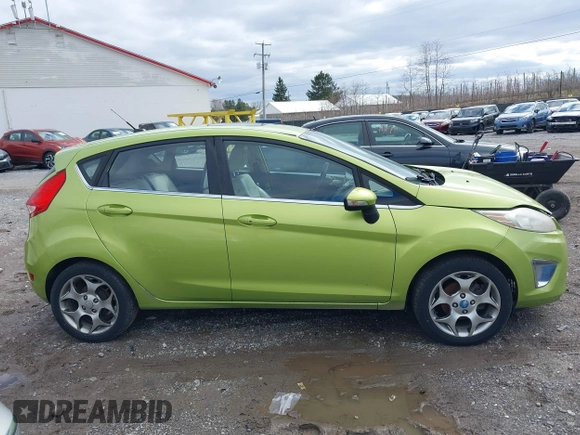 2011 Ford Fiesta SES with VIN 3FADP4FJ7BM131503, listed as a IAAI auction lot 41804351 with 233,620 mi miles. Bid and sale history available at carsss.com. Image 12.