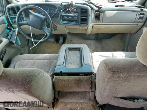2002 Chevrolet Tahoe LS z VIN 1GNEC13V92R136479, wystawiony jako Copart lot #59803055 z przebiegiem 165 718 mil mil oraz Czysty tytuł • Clean title. Historia ofert i sprzedaży dostępna na DreamBid. Obrazek 8.