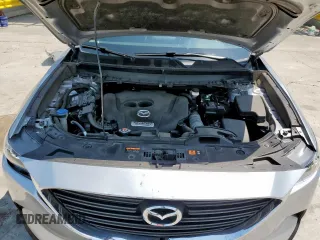2017 Mazda CX-9 Sport с VIN JM3TCABY0H0134894, выставлен на аукционе Copart как лот 58217865 с пробегом 100 227 миль миль и Списание • Salvage title. История ставок и продаж доступна на DreamBid. Изображение 12.