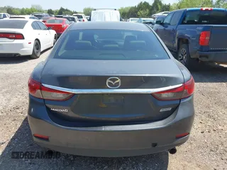 2014 Mazda Mazda6 i Touring with VIN JM1GJ1V6XE1154862, listed as a IAAI auction lot 42052904 with 301,752 mi miles. Bid and sale history available at carsss.com. Image 16.