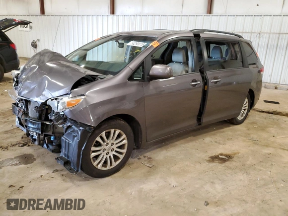 2014 Toyota Sienna XLE with VIN 5TDYK3DC0ES501557, listed as a Copart auction lot 56290015 with Not Provided miles and Clean Title. Bid and sale history available at DreamBid. Image 1.
