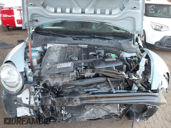 2013 Volkswagen Beetle 2.5L with VIN 3VW5P7AT9DM830477, listed as a IAAI auction lot 41957389 with Not Provided miles and . Bid and sale history available at DreamBid. Image 10.