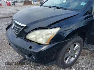 2006 Lexus RX 400h with VIN JTJGW31U560001666, listed as a IAAI auction lot 42257070 with 267,244 mi miles and . Bid and sale history available at DreamBid. Image 6.