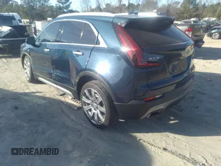 2019 Cadillac XT4 FWD Premium Luxury with VIN 1GYFZCR41KF202167, listed as a IAAI auction lot 35653161 with 64,132 mi miles and . Bid and sale history available at DreamBid. Image 3.