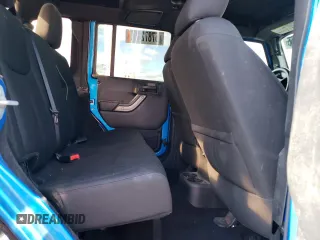 2016 Jeep Wrangler Unlimited Sport z VIN 1C4BJWDG3GL115622, wystawiony jako Copart lot #57872455 z przebiegiem 98 812 mil mil oraz Szkoda całkowita • Salvage title. Historia ofert i sprzedaży dostępna na DreamBid. Obrazek 11.