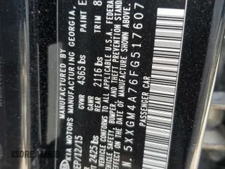 2015 Kia Optima LX z VIN 5XXGM4A76FG517607, wystawiony jako Copart lot #56585135 z przebiegiem 106 702 mil mil oraz Szkoda całkowita • Salvage title. Historia ofert i sprzedaży dostępna na DreamBid. Obrazek 12.