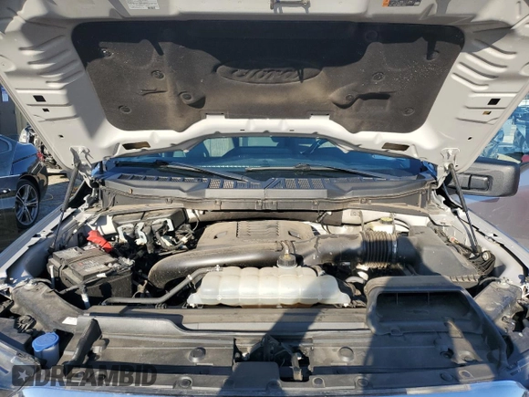2023 Ford F-150 XL with VIN 1FTEW1C84PKD44022, listed as a Copart auction lot 48854095 with 56,526 mi miles and Clean title. Bid and sale history available at DreamBid. Image 11.