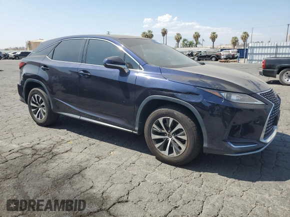 2020 Lexus RX with VIN 2T2AZMAA0LC164766, listed as a Copart auction lot 69867914 with 101,104 mi miles and Salvage Title. Bid and sale history available at carsss.com. Image 4.