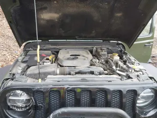 2021 Jeep Wrangler Unlimited Willys with VIN 1C4HJXDNXMW579595, listed as a IAAI auction lot 41930989 with 32,148 mi miles and . Bid and sale history available at DreamBid. Image 10.