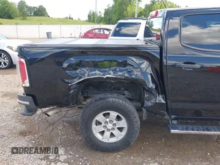 2018 GMC Canyon 2WD z VIN 1GTG5BEN9J1137949, wystawiony jako IAAI lot #42189911 z przebiegiem 98 296 mil mil oraz . Historia ofert i sprzedaży dostępna na DreamBid. Obrazek 20.