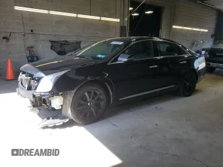 2014 Cadillac XTS Luxury z VIN 2G61N5S37E9214882, wystawiony jako Copart lot #54762995 z przebiegiem 134 363 mil mil oraz Szkoda całkowita • Salvage title. Historia ofert i sprzedaży dostępna na DreamBid. Obrazek 1.