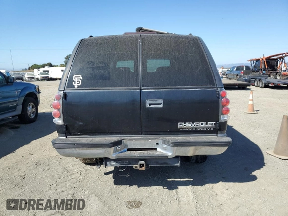 1999 Chevrolet Suburban with VIN 1GNGK26R5XJ513945, listed as a Copart auction lot 73673314 with 198,656 mi miles and Clean Title. Bid and sale history available at carsss.com. Image 6.