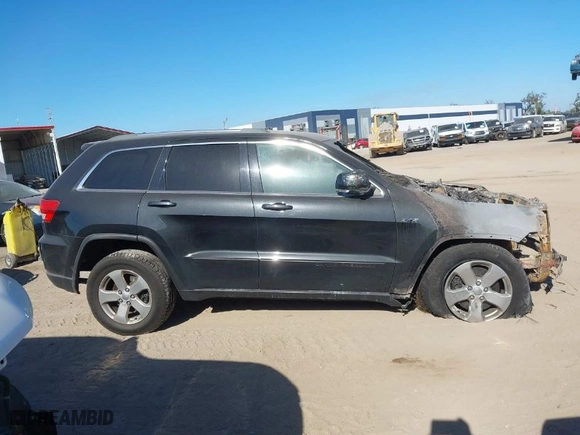 2013 Jeep Grand Cherokee Limited with VIN 1C4RJFBTXDC575676, listed as a IAAI auction lot 41174929 with 1 mi miles. Bid and sale history available at carsss.com. Image 13.