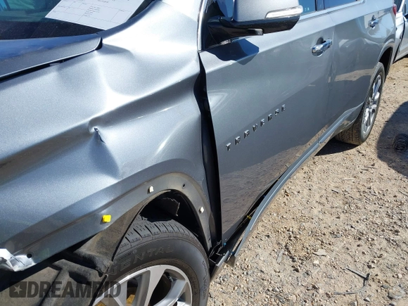 2020 Chevrolet Traverse Premier with VIN 1GNERKKW3LJ128117, listed as a IAAI auction lot 41857067 with 77,700 mi miles and . Bid and sale history available at DreamBid. Image 18.