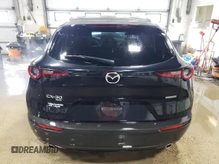 2023 Mazda CX-30 S Premium with VIN 3MVDMBDM0PM520591, listed as a Copart auction lot 48178215 with 9,999 mi miles and Salvage Title. Bid and sale history available at DreamBid. Image 6.