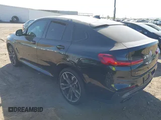 2020 BMW X4 M40i with VIN 5UX2V5C04L9D26548, listed as a IAAI auction lot 42473480 with Not provided miles and . Bid and sale history available at DreamBid. Image 3.