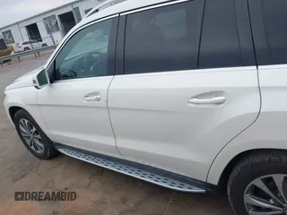 2016 Mercedes-Benz GL with VIN 4JGDF6EE7GA673861, listed as a IAAI auction lot 41803302 with 74,670 mi miles. Bid and sale history available at carsss.com. Image 14.