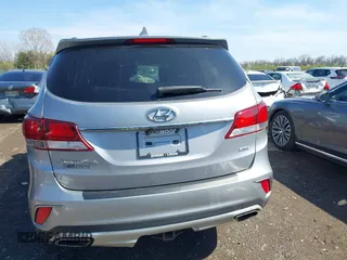2018 Hyundai Santa Fe SE z VIN KM8SMDHF8JU289373, wystawiony jako IAAI lot #41935388 z przebiegiem 166 792 mil mil oraz . Historia ofert i sprzedaży dostępna na DreamBid. Obrazek 17.