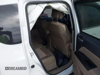 2012 Jeep Compass Latitude with VIN 1C4NJDEB9CD612599, listed as a IAAI auction lot 41582214 with 138,312 mi miles. Bid and sale history available at carsss.com. Image 8.