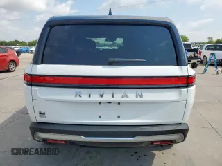 2025 Rivian R1S Adventure z VIN 7PDSGBBA3SN046975, wystawiony jako Copart lot #61790405 z przebiegiem 8 427 mil mil oraz Szkoda całkowita • Salvage title. Historia ofert i sprzedaży dostępna na DreamBid. Obrazek 6.