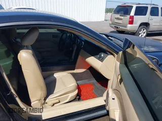 2005 Ford Mustang Deluxe with VIN 1ZVFT80N455122217, listed as a IAAI auction lot 42015083 with 154,396 mi miles. Bid and sale history available at carsss.com. Image 5.